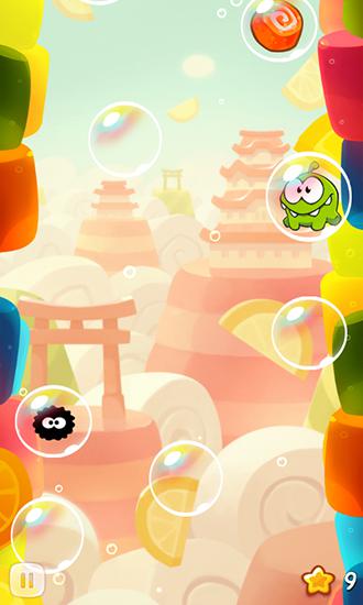 Gameplay of the Om Nom: Bubbles for Android phone or tablet.