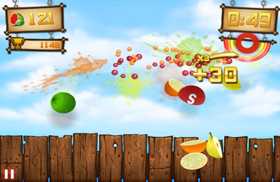 Gameplay screenshots of the Fruit Ninja vs Skittles for iPad, iPhone or iPod.