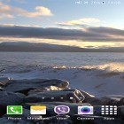 Download live wallpaper Waves on rocks for free and Mountains now for Android phones and tablets .